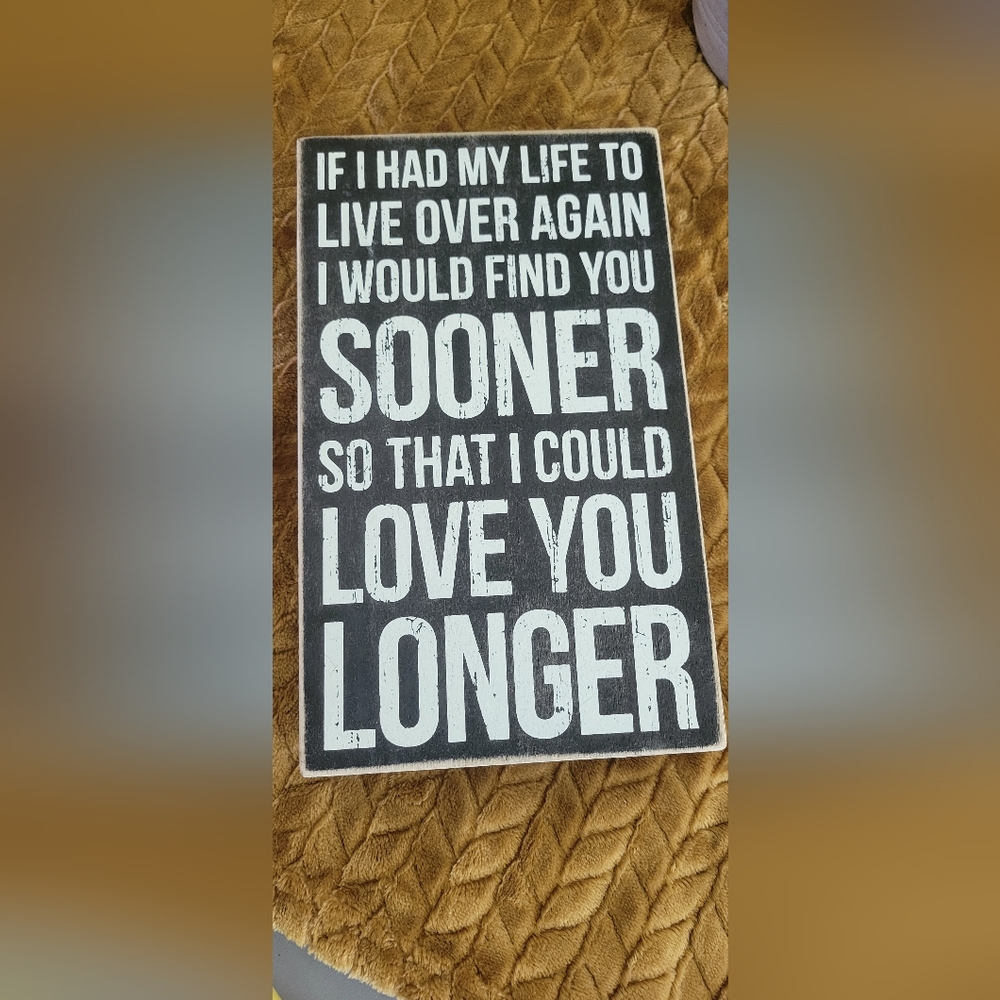 Sign for wall or to sit up on table